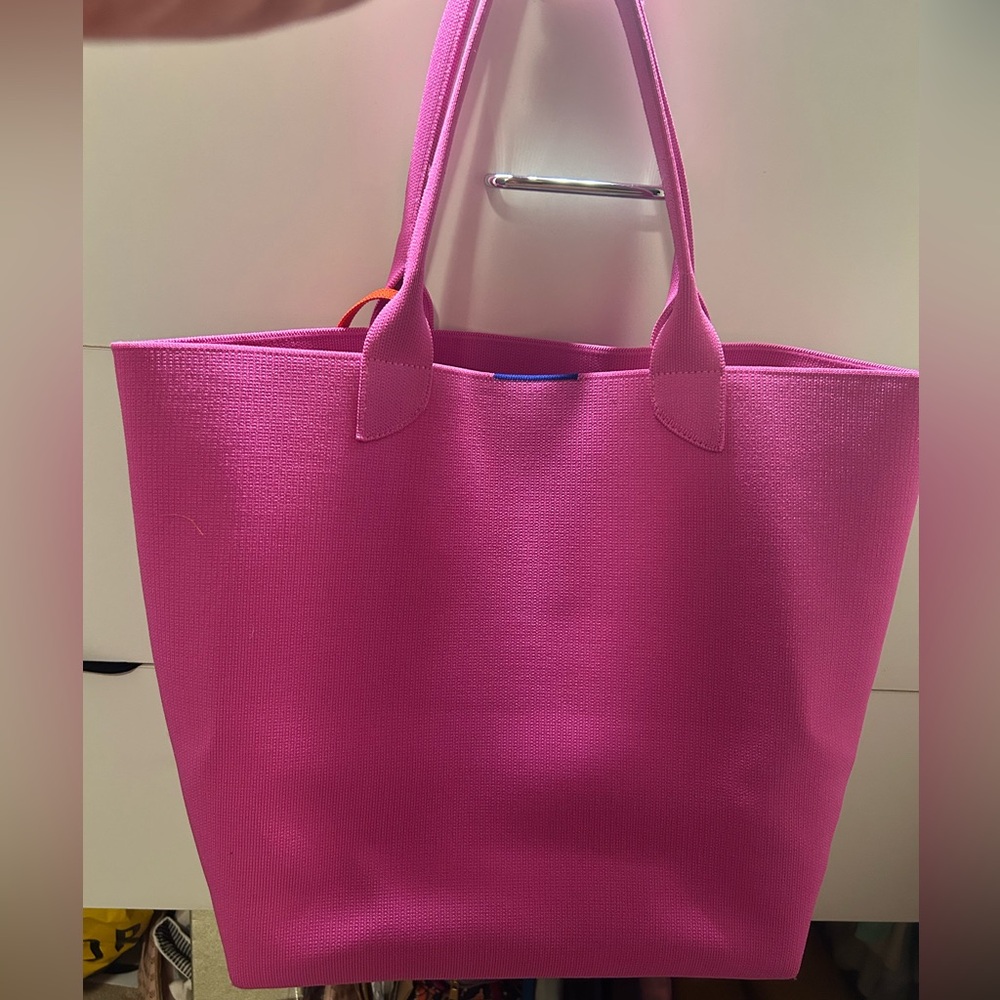 Brand new Rothy’s lightweight tote in dragon fruit.